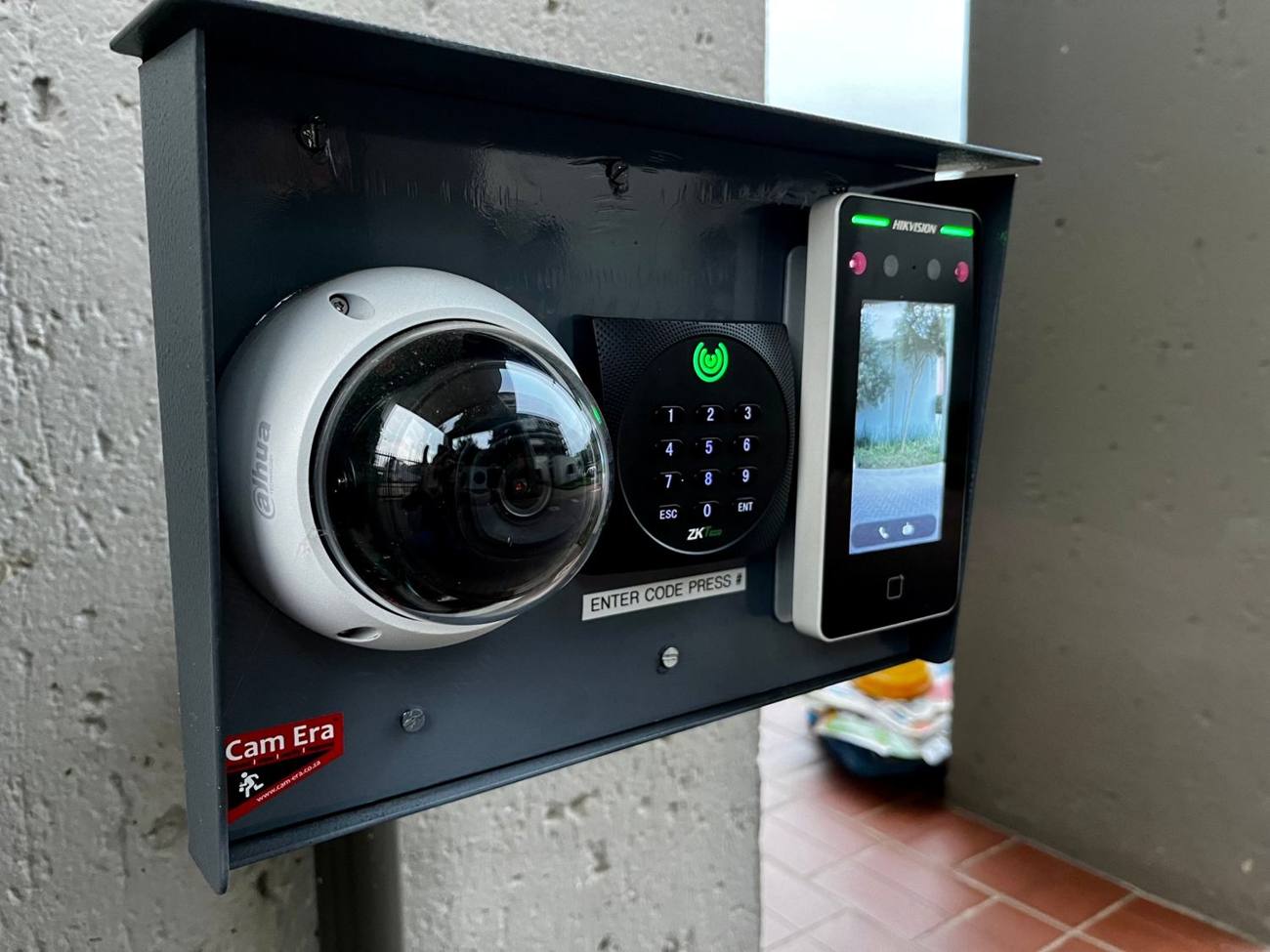 Cam Era access panel with a dome camera, keypad and face reader